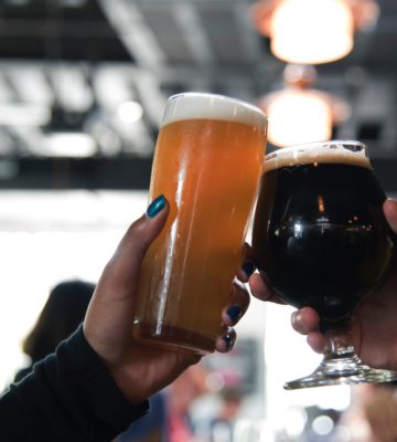 Toasting with 2 Beer Glasses