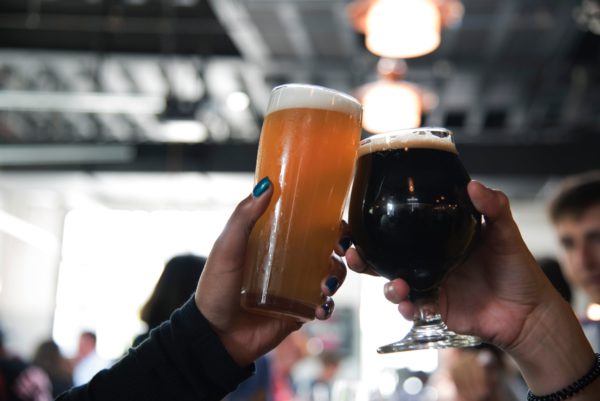 Toasting with 2 Beer Glasses