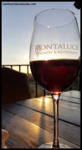 Montaluce - Glass of Red Wine - GaMountainsGuide.om