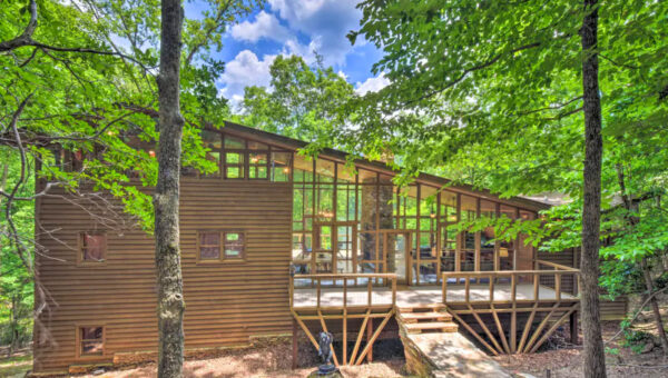 Lakefront Glass House rental with mountain views